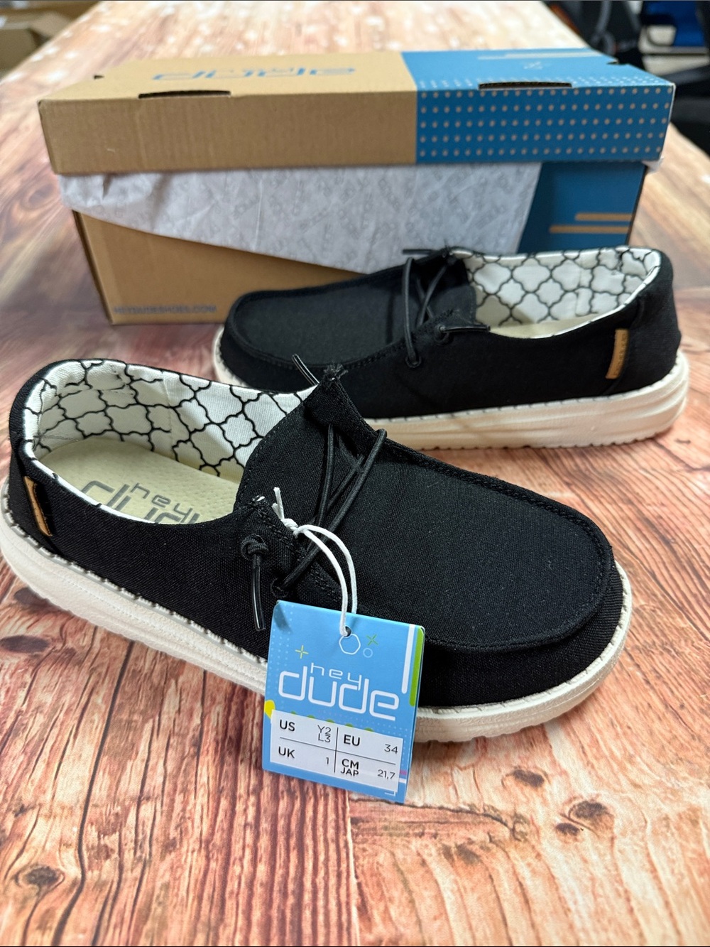 Hey Dude Youth Wendy Black Canvas Slip-On Shoes these are( unisex) shoes